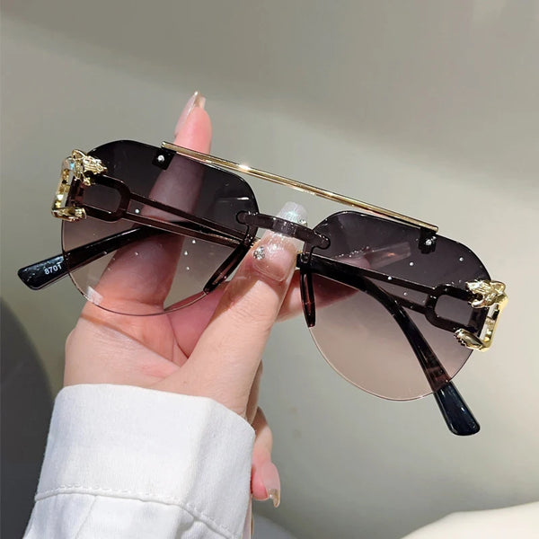Stand Out in Style with KAMMPT Vintage Rimless Pilot Sunglasses!